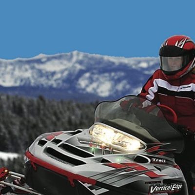 woman snowmobile rider